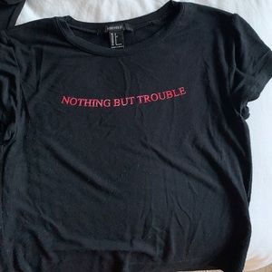 Black crop top with graphic on the front